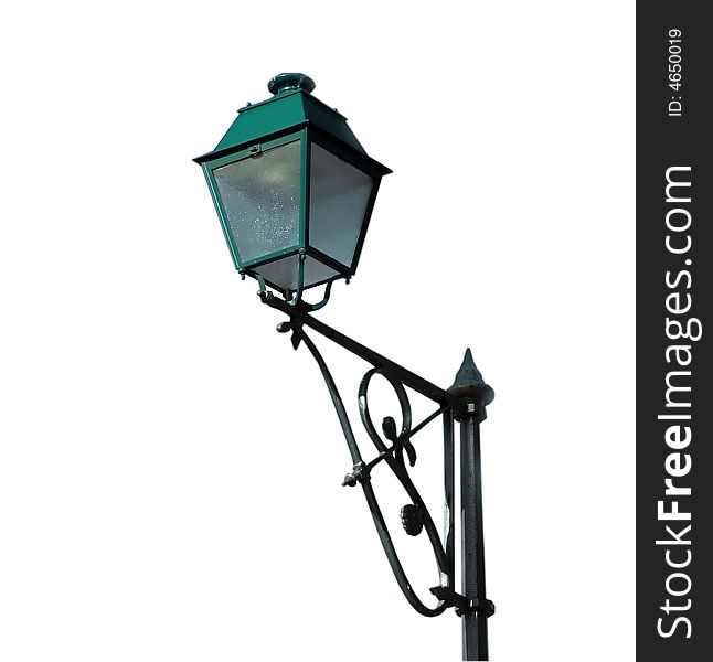 Green metal and glass street lamp