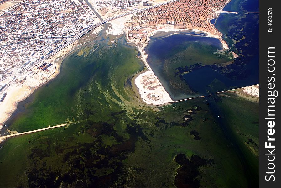 Photo from the plane, a green lagoon, Tunisia. Photo from the plane, a green lagoon, Tunisia