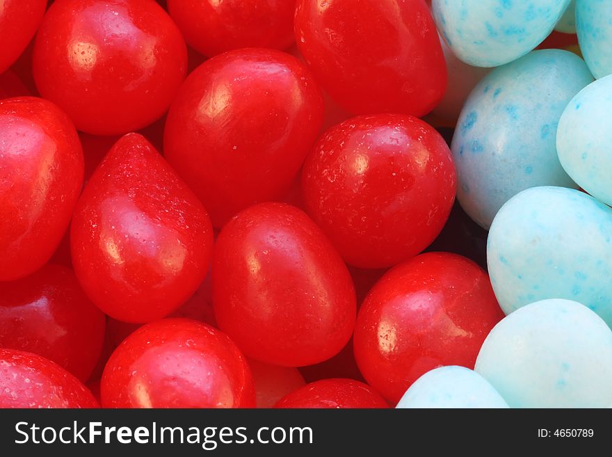 Red and blue Easter candies fill the screen. Red and blue Easter candies fill the screen
