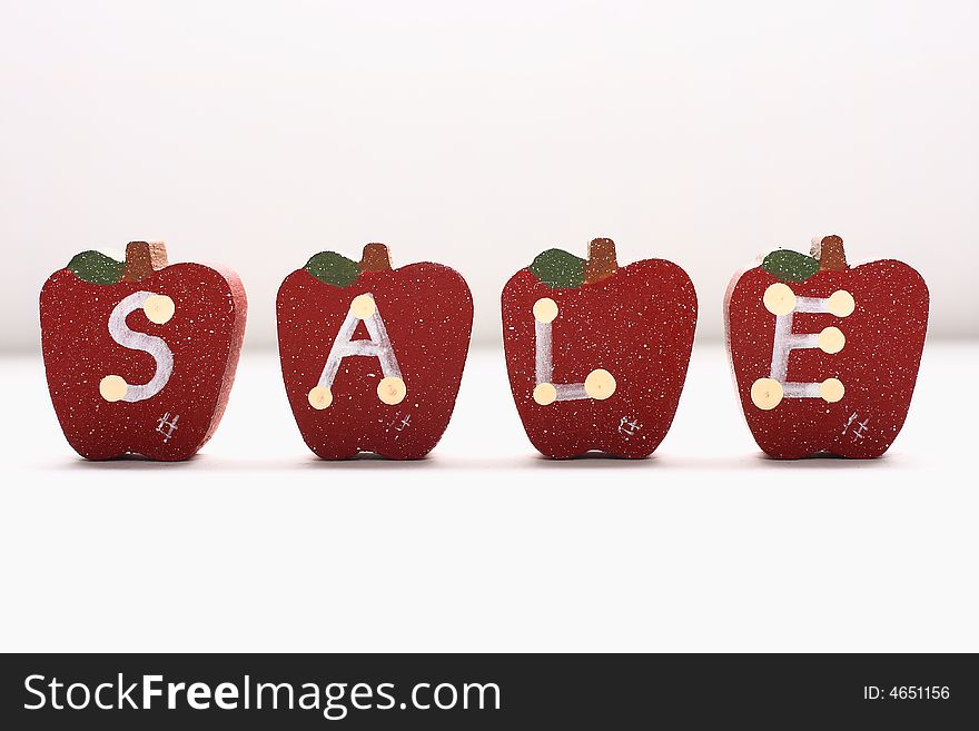 Wooden Apples with letterings spelling sale.