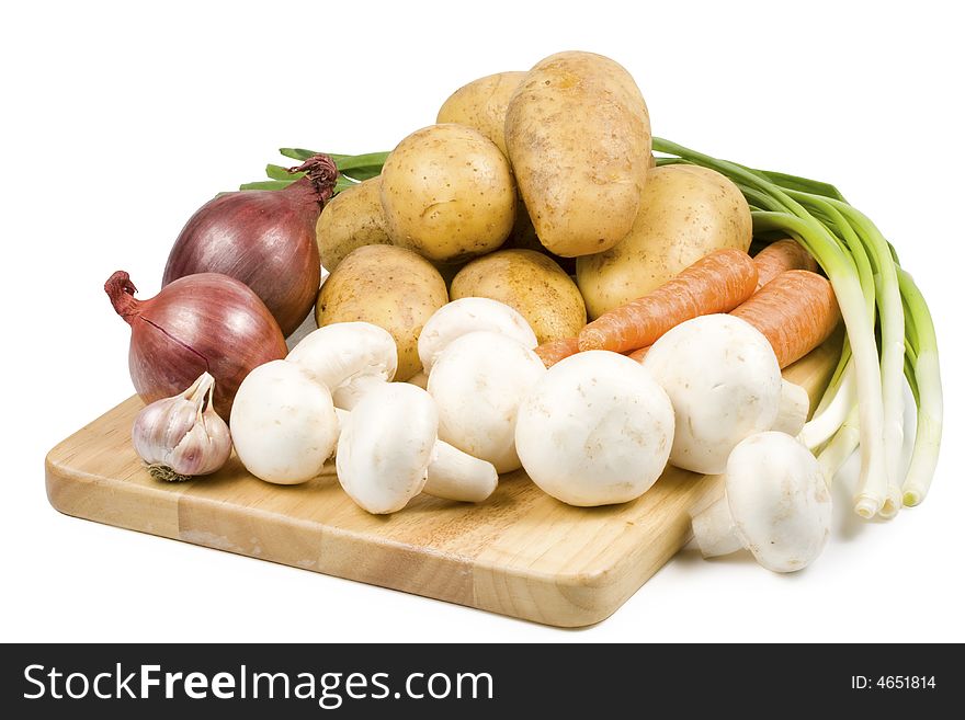 Still-life with vegetables isolated on a white background. Clipping path included. Still-life with vegetables isolated on a white background. Clipping path included.