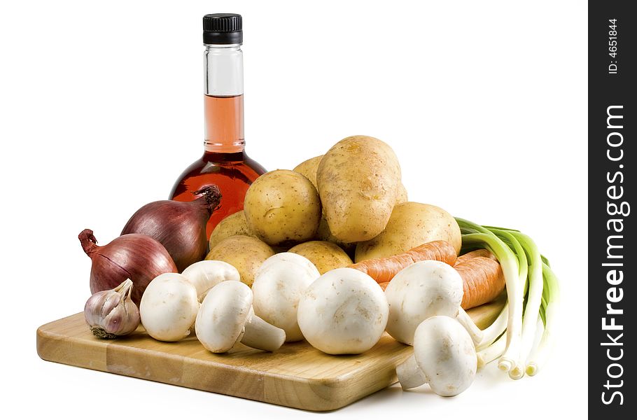 Still-life with vegetables isolated on a white background. Clipping path included. Still-life with vegetables isolated on a white background. Clipping path included.