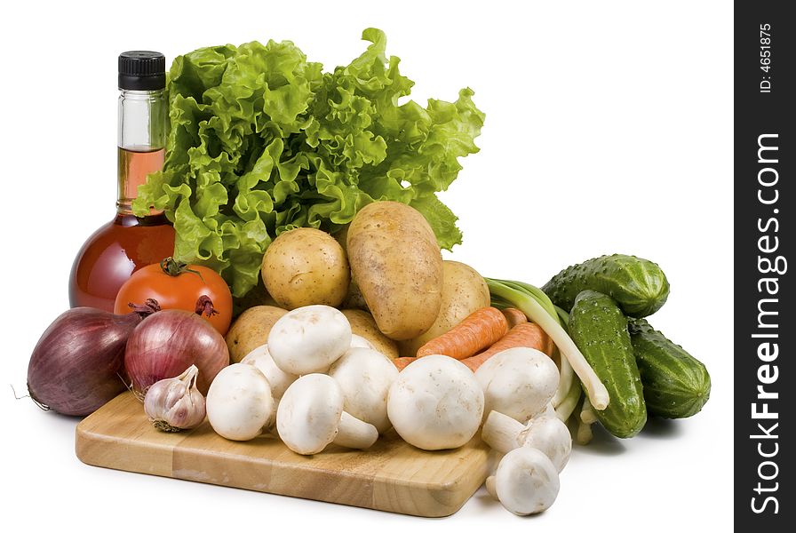 Still-life with vegetables isolated on a white background. Clipping path included. Still-life with vegetables isolated on a white background. Clipping path included.