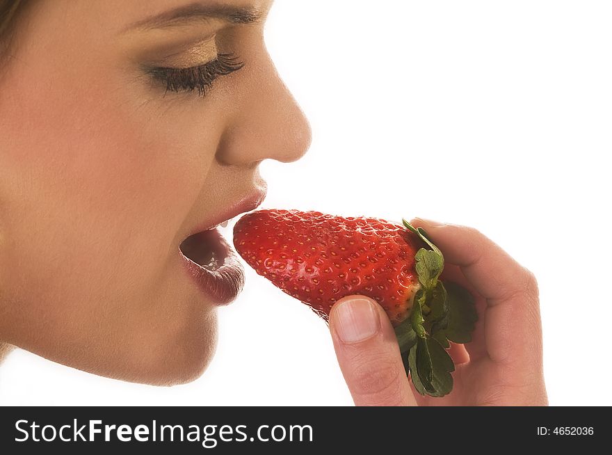 Erotic lips tasting a strawberry. Erotic lips tasting a strawberry