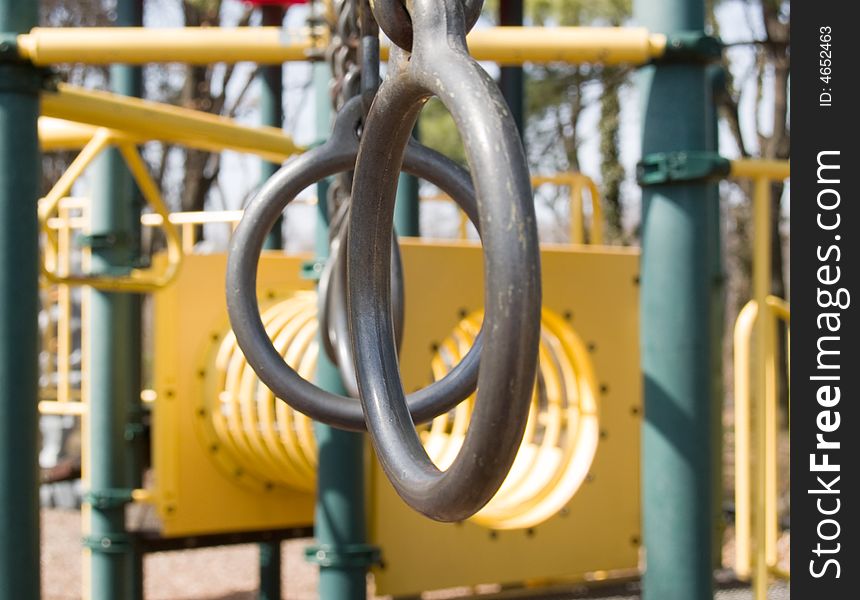 Gymnastics rings from a playground, taken in Spring. Gymnastics rings from a playground, taken in Spring.