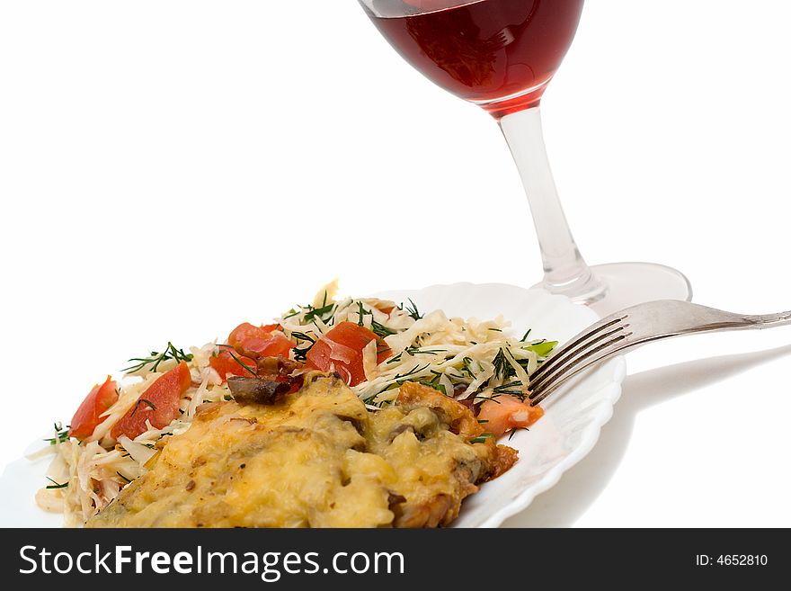 Vegetarian salad and meat on plate, isolated on white