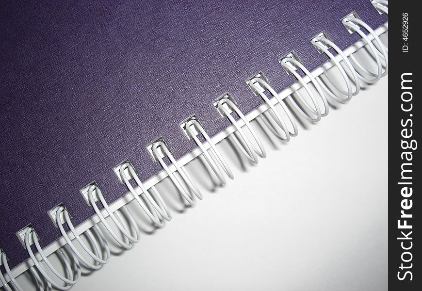 Closeup view of a ringed notebook. Closeup view of a ringed notebook