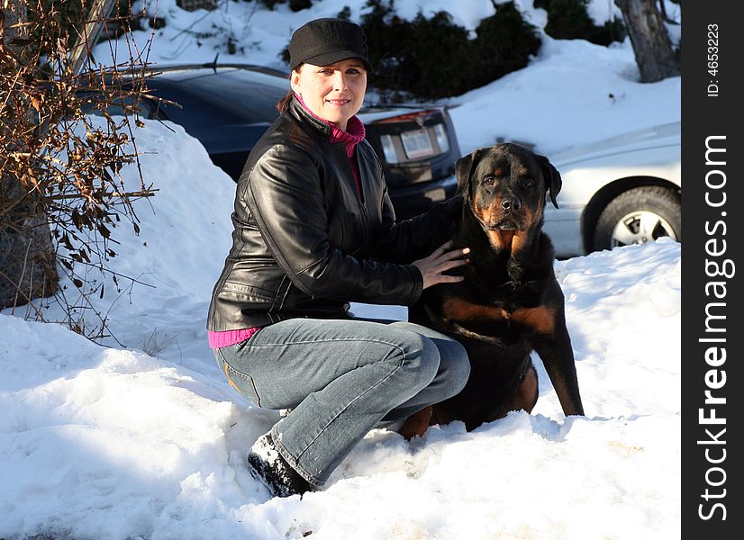 Woman and her dog, license plate blurred out