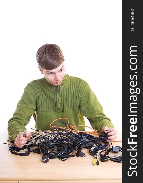 The young guy with cables isolated on a white background