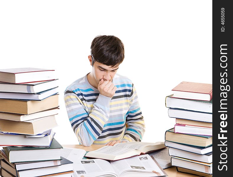 The young student with books isolated on a white