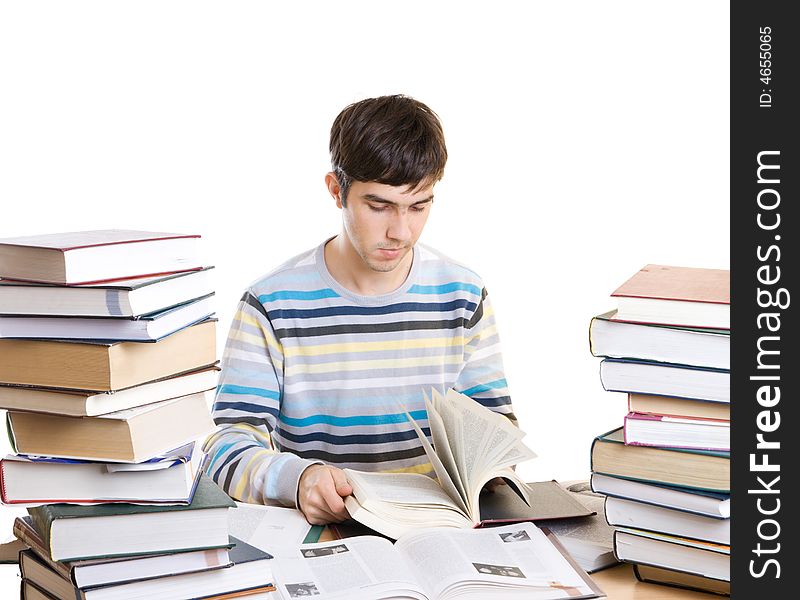 The young student with books isolated on a white background