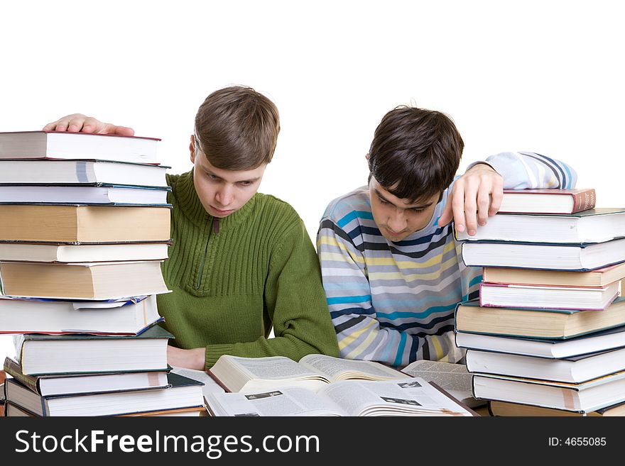 Two students with books isolated on a white background