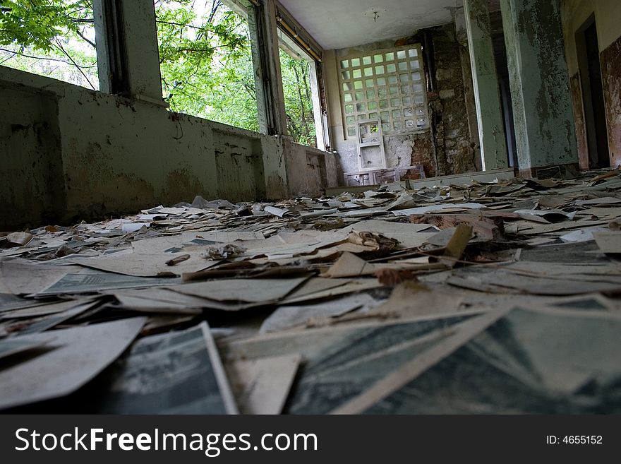 A lot of old post card in a ruined hall. A lot of old post card in a ruined hall