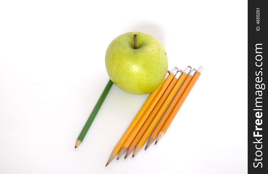 Colorful Pencils And Apple