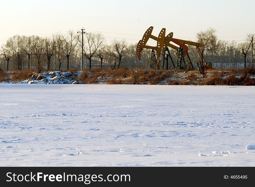 In snow ground of take out the oil machine. In snow ground of take out the oil machine