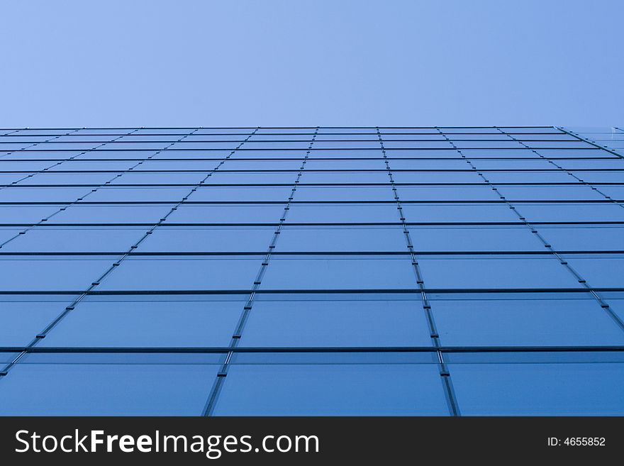 Glass wall and the sky above it. Glass wall and the sky above it