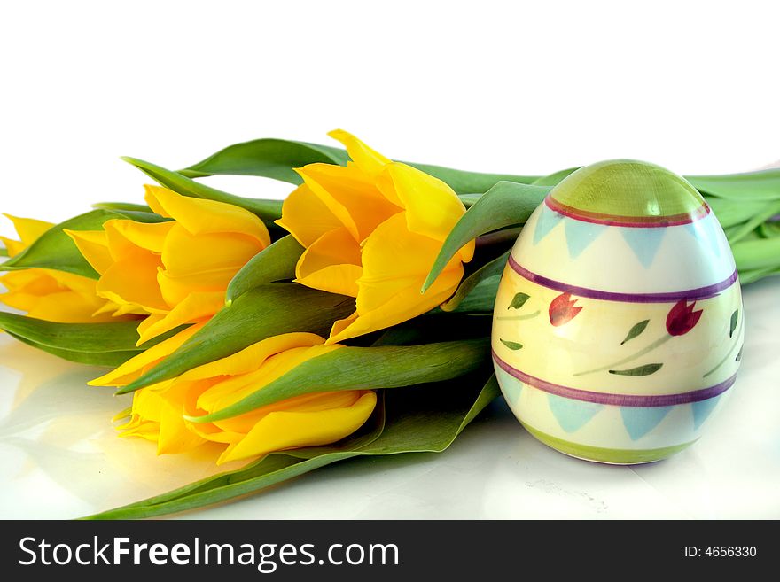 Colorful eggs, easter, yellow tulips