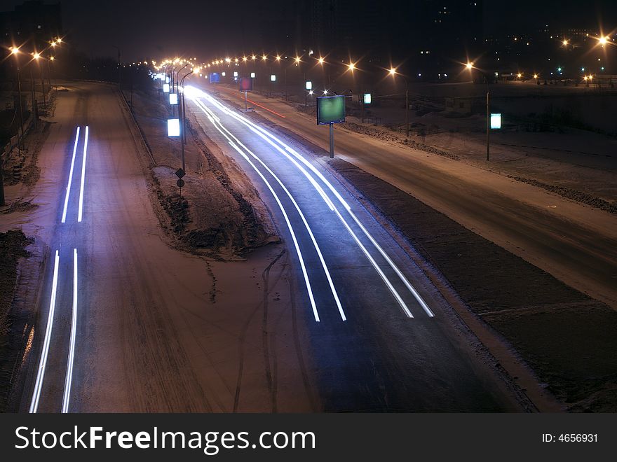 Night traffic roads junction headlight blurs. Night traffic roads junction headlight blurs