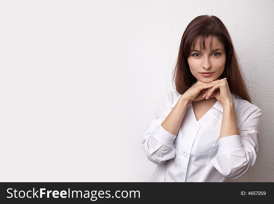 Young woman on the white background
