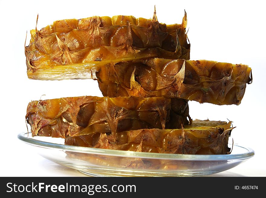 Pineapple cut on a part on a white background isolated