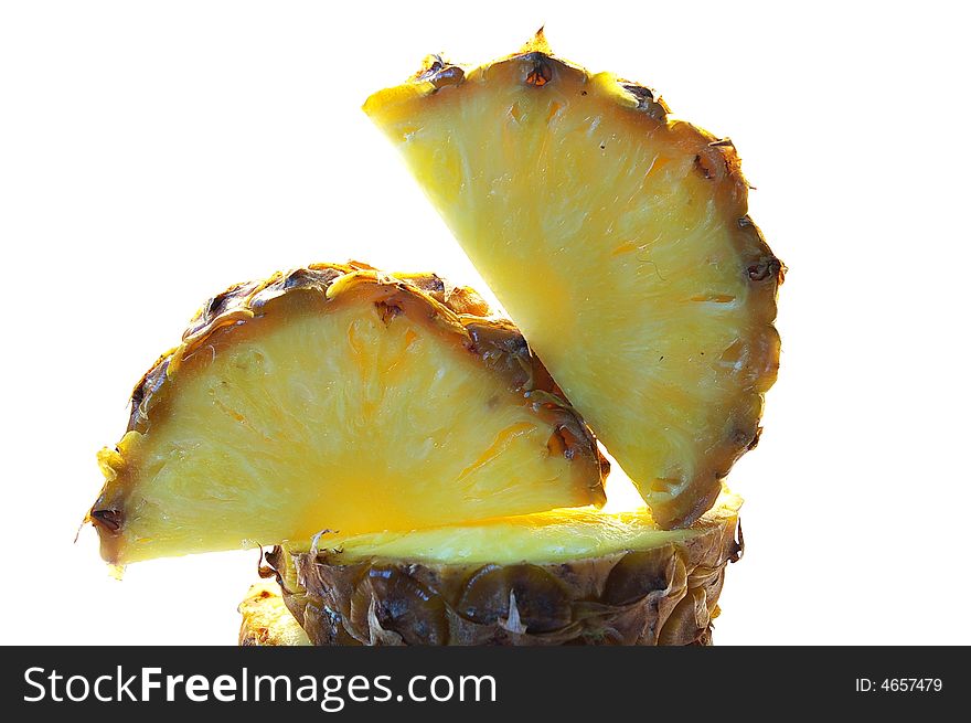 Pineapple cut on a part on a white background isolated. Pineapple cut on a part on a white background isolated