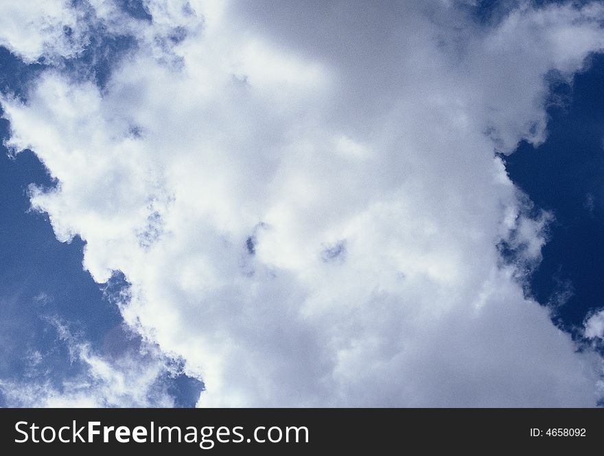 Clouds blocking the sunny blue sky. Clouds blocking the sunny blue sky