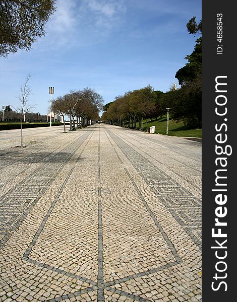 A pavement made out of tiles in Portugal. A pavement made out of tiles in Portugal