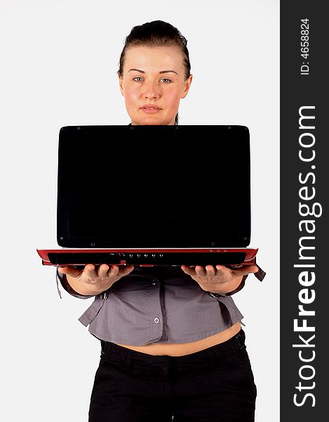 Attractive brunette woman holding laptop on white background. Attractive brunette woman holding laptop on white background