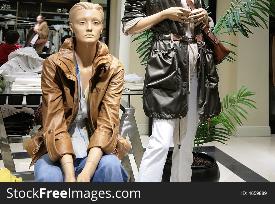 Mannequins in the clothing store. Mannequins in the clothing store