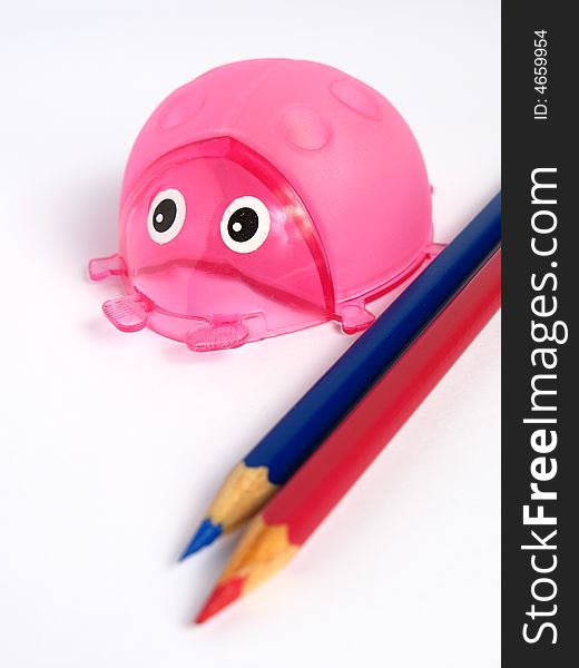 Pink Ladybug Pencil Holder, with pencils on white background