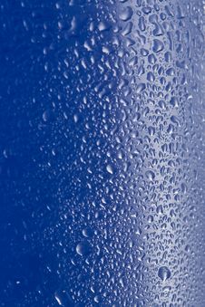 Water On Blue Glass Stock Image