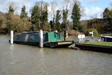 Narrowboat Moored On The River Thames Royalty Free Stock Images Narrowboat Moored On The River Thames Royalty Free Stock Images