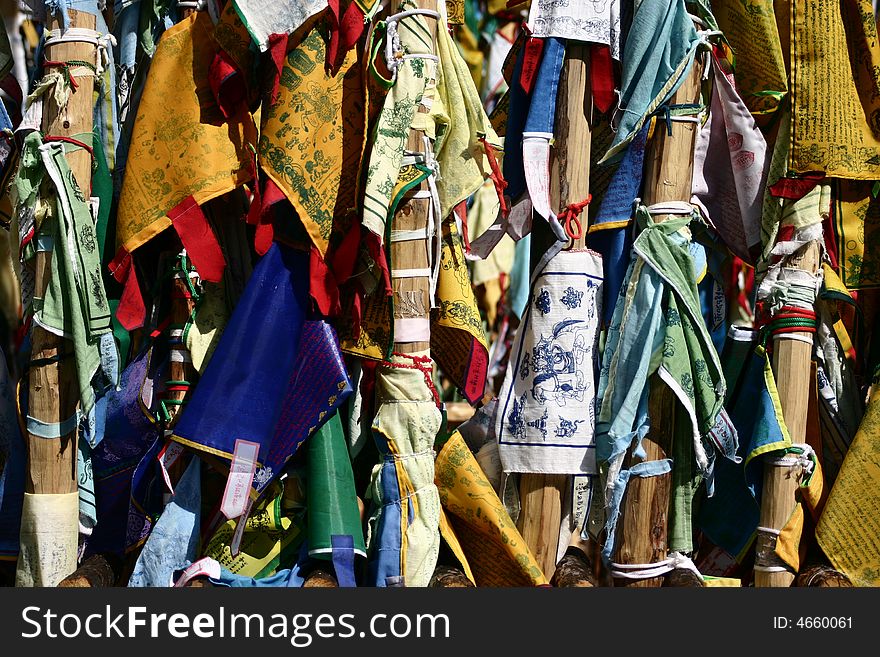 A group of buddhist prayers tied to poles in siberia