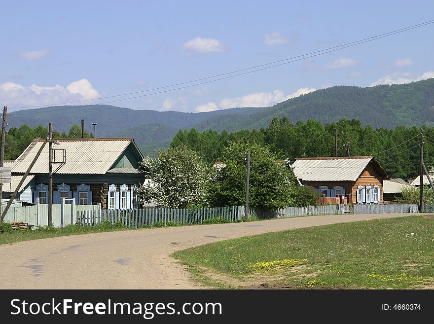 A siberian village with datcha in summer