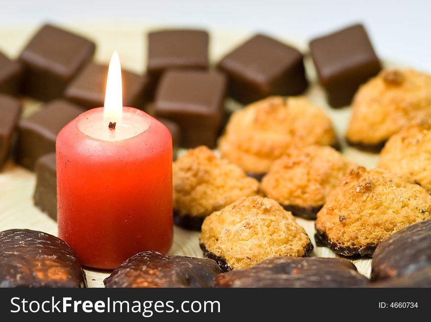 Christmas sweeties with red candle