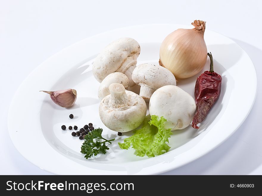 Food series: some mushrooms on the white plate