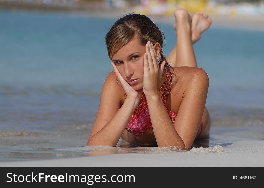 Woman Lying In The Seaside