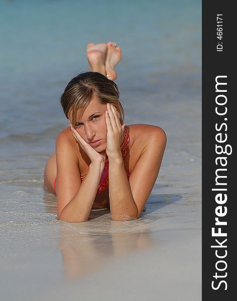 Woman Lying In The Seaside