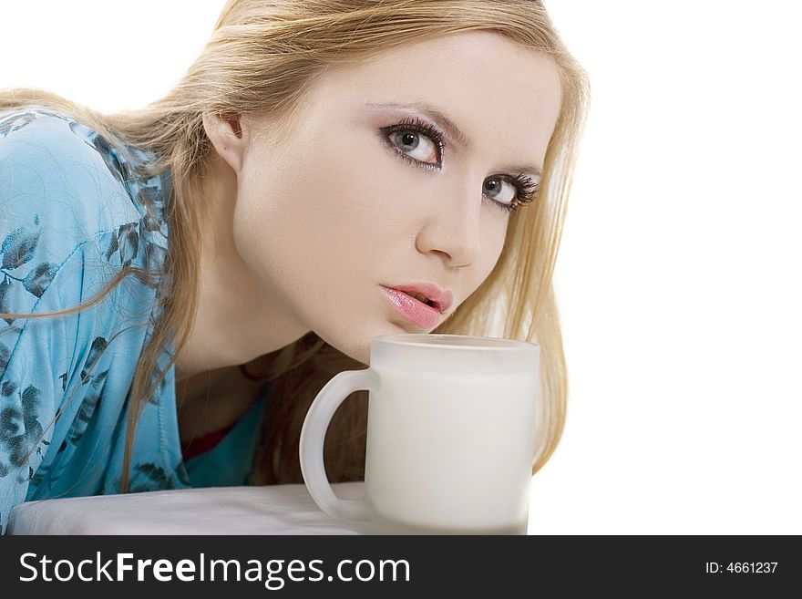 Cute lady in blue blouse drinks milk. Cute lady in blue blouse drinks milk