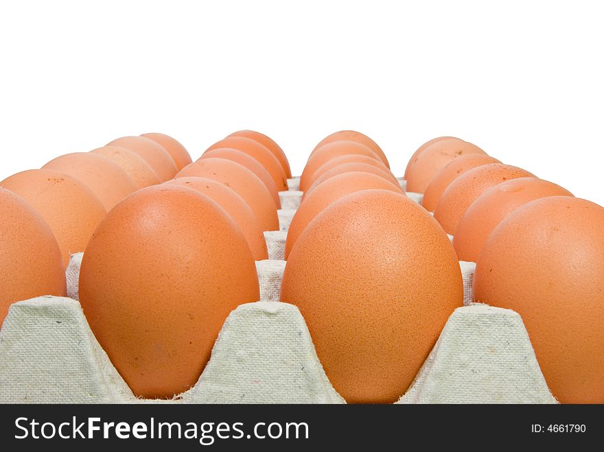 Eggs in embossed box on white background. Working path included.