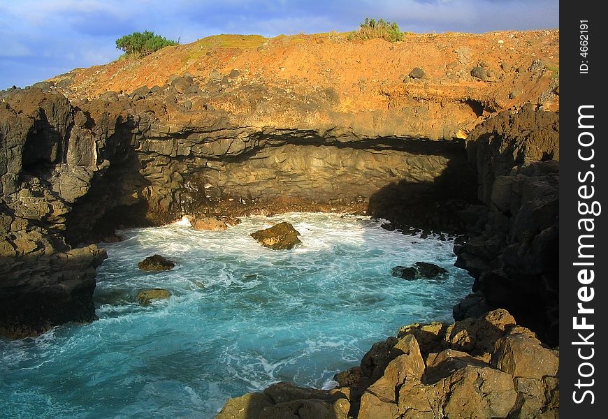 Sunset rocks and stormy water of Atlantic ocean. Sunset rocks and stormy water of Atlantic ocean