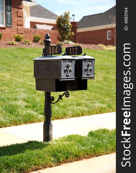 Two old mailboxes by the side of the road. Two old mailboxes by the side of the road.