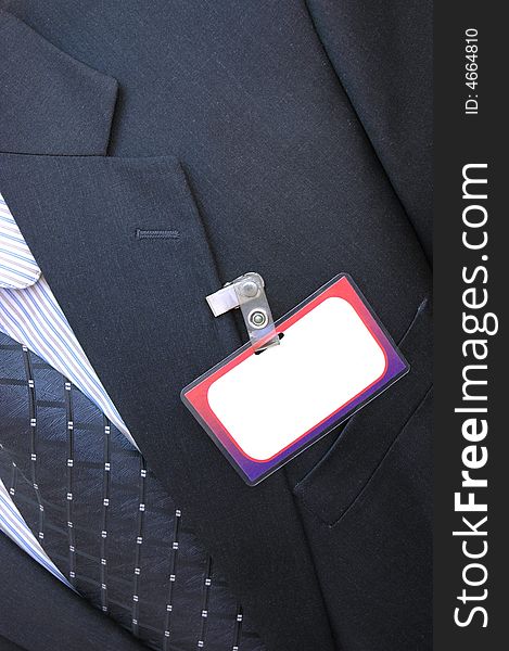 Photo of businessman with empty badge. Photo of businessman with empty badge