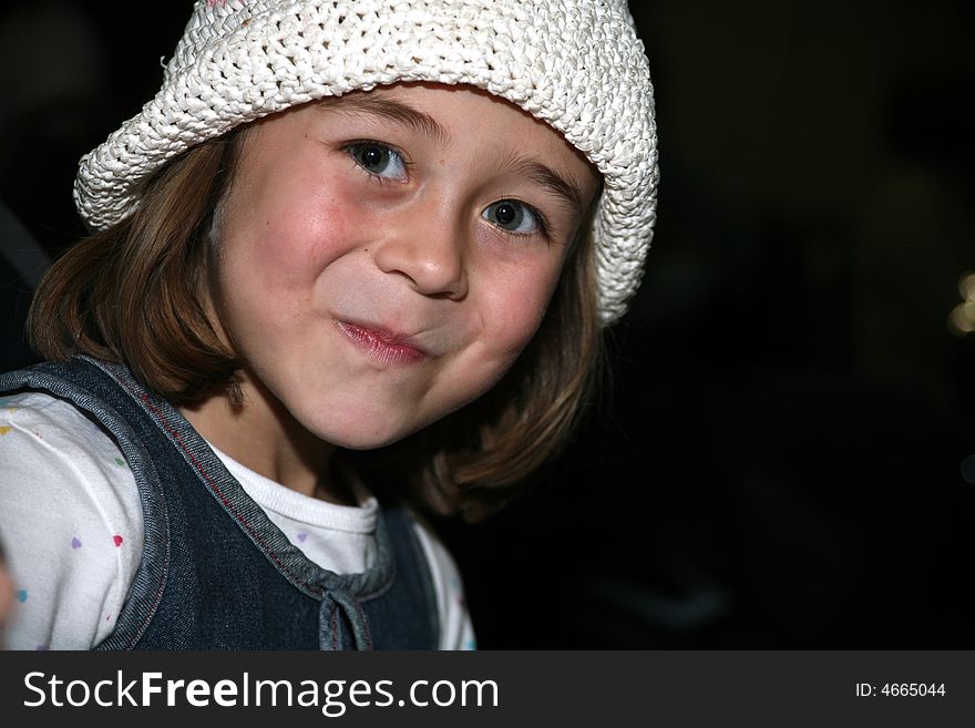 Cute Girl with a Curious Smile