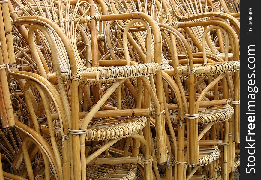 Rattan chairs on the pile