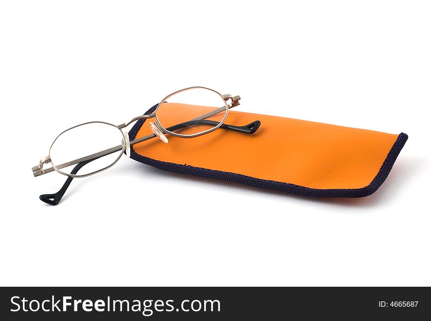 Eyeglasses and orange glasses case isolated on white. Eyeglasses and orange glasses case isolated on white