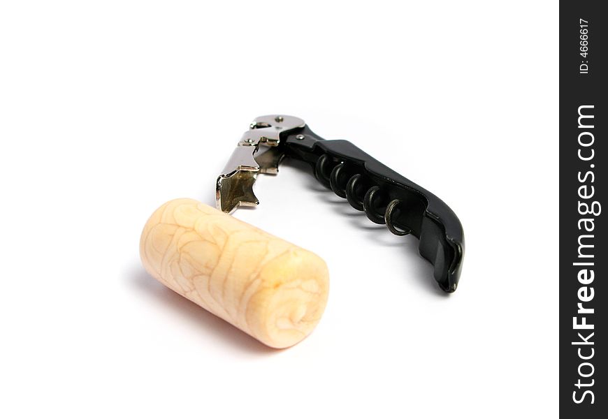 Professional metal cork screw with the cork. Isolated photo.