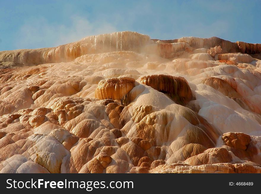 Steaming vapor coming from a geyser in Yellowstone Park. Steaming vapor coming from a geyser in Yellowstone Park.