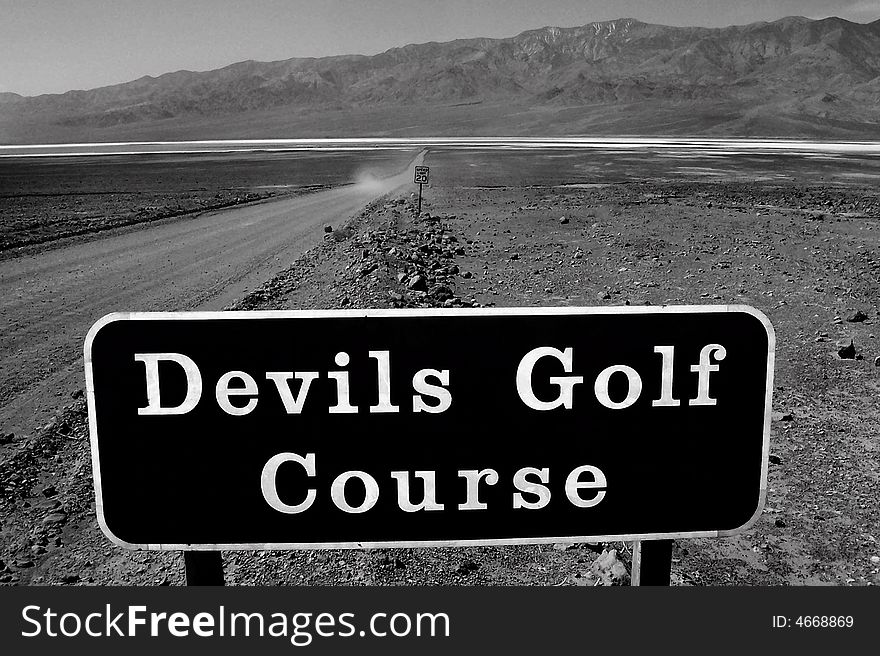 This signs leads to Devils Golf Course in the heart of Death Valley California.