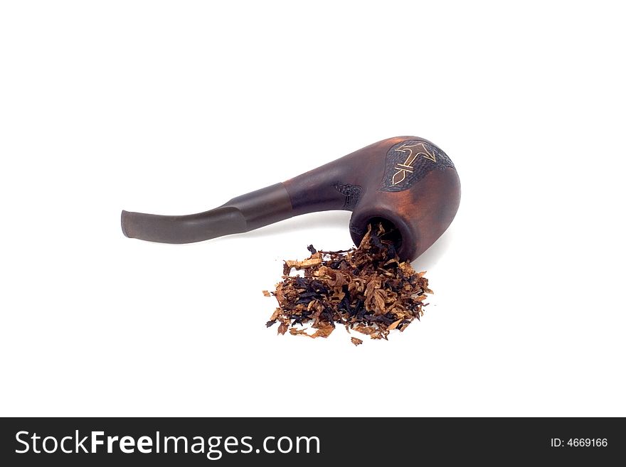 Old brown and black tobacco pipe with a heap of tobacco isolated on white. Old brown and black tobacco pipe with a heap of tobacco isolated on white